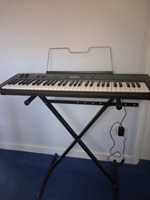 Yamaha DX27 61-Key Electronic Keyboard Black w/ Stand, Music Stand, MIDI