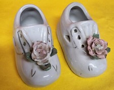 Vintage Porcelain baby shoes w/raised roses on toes