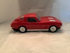 vintage red Corvette VHS tape rewinder.