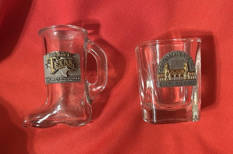 2 Shot Glasses With Metal Emblem Destination American Ellis Island & Texas Boot