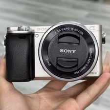 95 NEW Sony Alpha A6000 Mirrorless Digital Camera w/16-50mm Lens Charger Battery