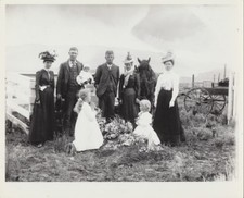 PHOTO OF FAMILY AT COLORADO GRAVE SITE FROM NEGATIVE ON PHOTO PAPER
