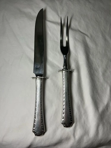 A Set of Two Wallace Fork & Knife Stainless Steel with Sterling Handle