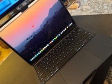 macbook pro 14 inch, black, perfect condition...