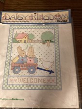 Daisy kingdom. By Bucilla. Stamped Cross Stitch Sampler. Pattern Cloth Provided