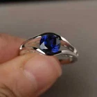 1 Ct Round Lab-Created Sapphire Split Shank Engagement Ring 14K White Gold Over