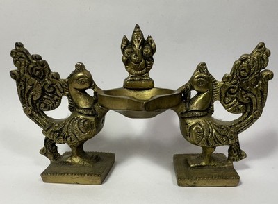 Brass Peacock Diya Oil Lamp with a Ganesha Idol at The Center