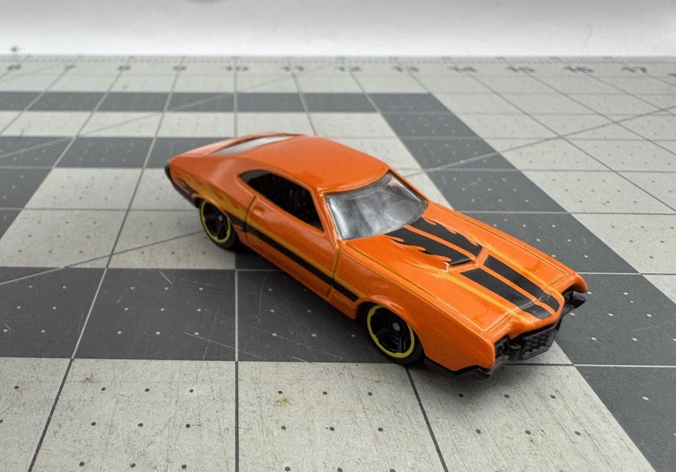 2010 Hot Wheels Dixie Challenger HW Main Street '11 Series #T9872 orange 1:64 - Image 4 of 4