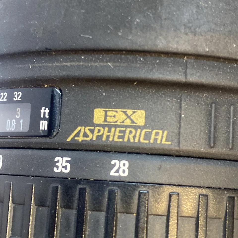 Lente zoom vintage Canon EOS D60 con Sigma AF-MF 28-70 mm F2,8 Ex asférica DF y + Foto 3 de 4