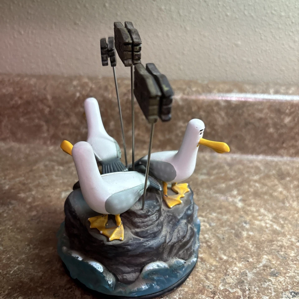 Figura de recuerdo del parque Disney gaviotas encontrando a Nemo mina mina nota/foto holde Foto 3 de 4