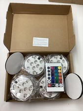  1 box of 4  Multi Function LED Remote Control Lights for Party's