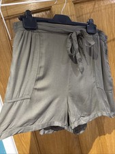 Lovely Flowy Loose Fit Khaki Shorts. 18 zip Pockets
