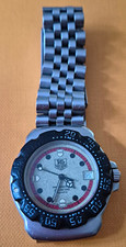 TAG Heuer Professional WA1211, 200m Quartz, Steel Bracelet, Rotating Bezel, Date