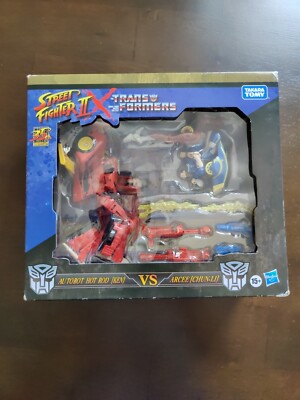 Street Fighter II X Transformers Autobot Hot Rod (Ken) Vs Arcee (Chun-Li) Hasbro
