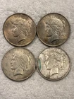 Lot of 4 Peace Silver Dollars - 2 - 1922P and 2 - 1922D