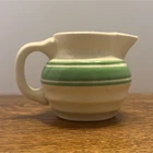 Hull Beehive Green Stripe Yellowware small ball pitcher.