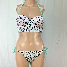 Bikini. Unbranded. White with Teal animal print. Sz S. No sz tag . Nylon