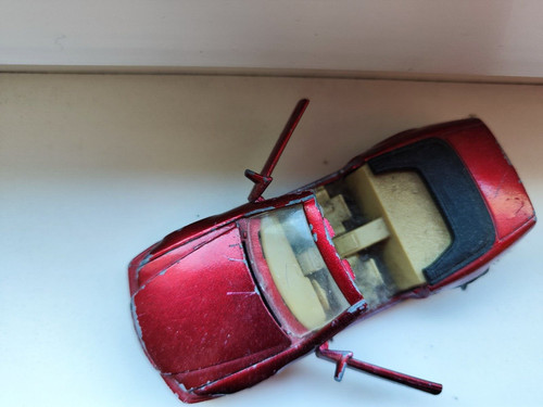 Welly Mercedes Benz 500 SL R129 rot mit Friktionsmotor Defekt