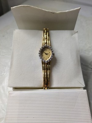 Vintage Pulsar Womens Gold Tone Watch V400 L398 A Gold Tone Band  New Batt 6.5''