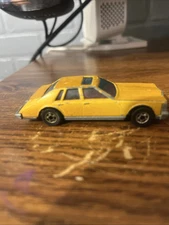 Vintage Hot Wheels Cadillac Seville 1983 Gold Metal Flake 1/64 Diecast Car