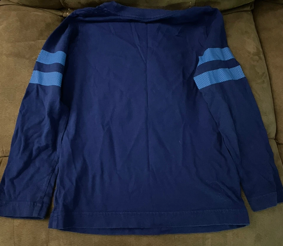 Camiseta Nike Niños 6 Camisa Manga Larga Azul Usada en Excelente Condición Futuro Dorado Ganador Talla 6 Foto 3 de 4