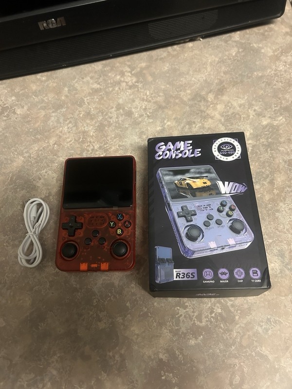 Retro Handheld Gaming Console In Brand New Condition