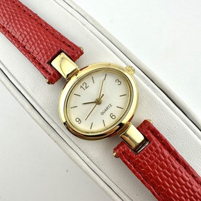 Gold Tone Quartz Watch Womens Oval White Dial Red Strap Japan Movement Analog