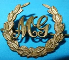 WW1 MACHINE GUNNER (MG) BRITISH MILITARY TRADE BADGE GENUINE BRASS WORLD WAR I