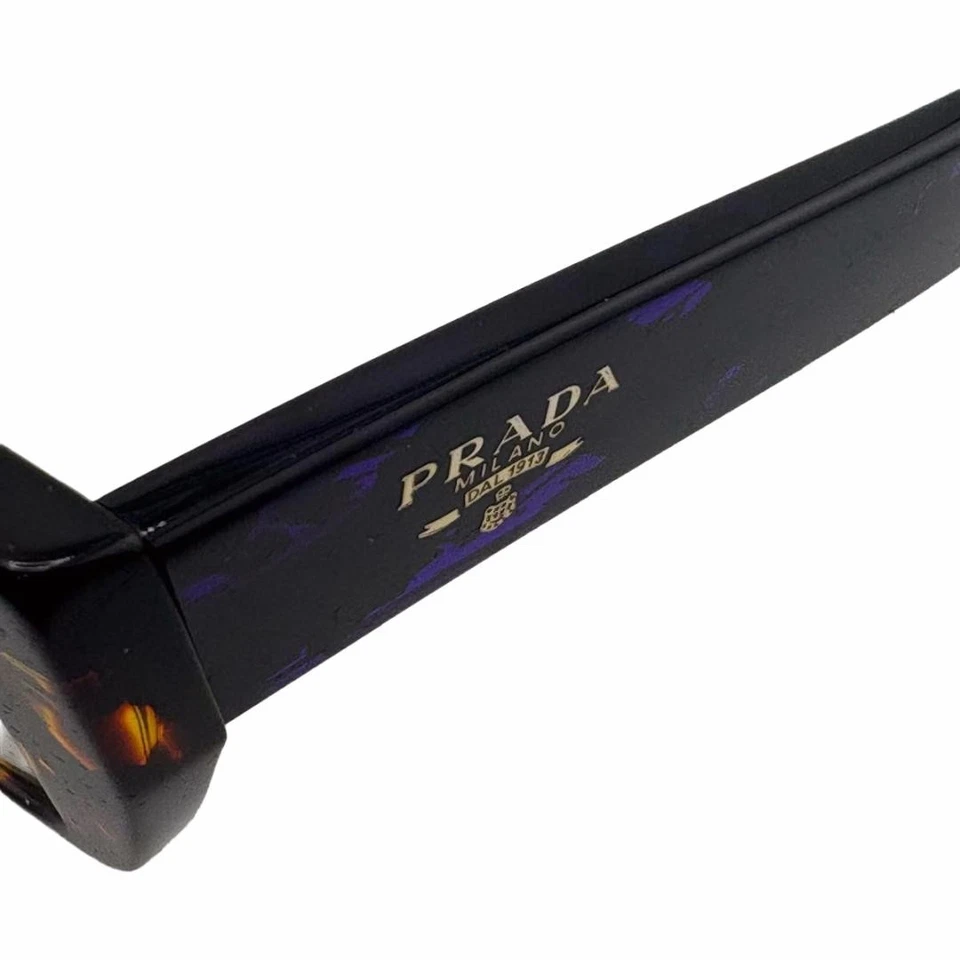 Monturas de gafas Prada PR A03 marrón/púrpura 50 mm 18 mm 140 mm-140-1O1 - DEFECTUOSAS Foto 3 de 4