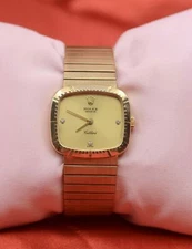 Ladies Rolex Cellini 18K Yellow Gold watch w/Diamonds