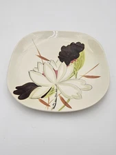 Red Wing Lotus Bronze Dinner Plates. Total of 7 plates in good condition.