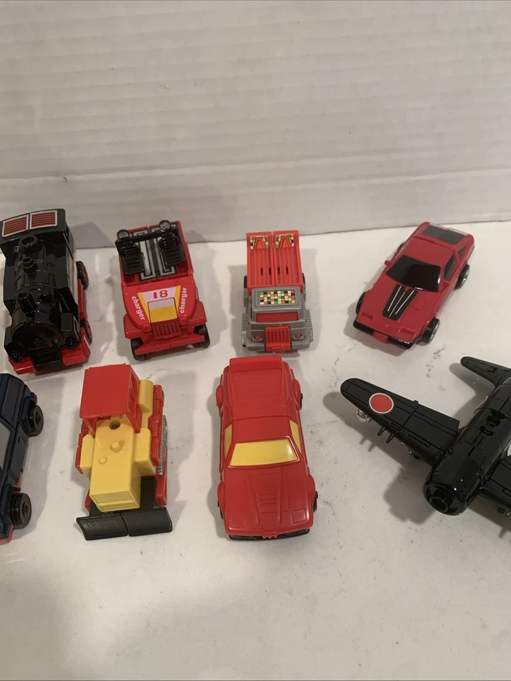 Lot Of 10 Vintage 1980's Bandai, MC Toy, Tonka,  Buddy, Mini Transformers - Image 3 of 4