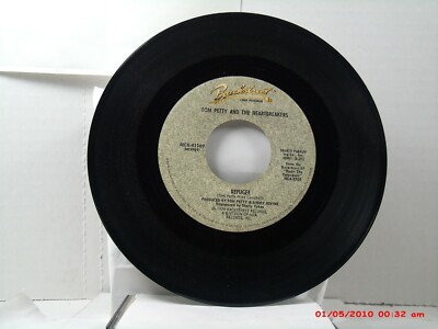TOM PETTY AND THE HEARTBREAKERS -(45)- REFUGEE / IT'S RAINING AGAIN  -  1979