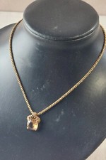 Collier, en métal doré, pierre orange / marron, Swarovski