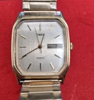 Vintage Timex Quartz Analog Day/Date Rectangle Men's Tank Dress Watch Runs 29mm