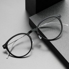 Montatura occhiali trasparente senza viti design metallo ovale lenti trasparenti