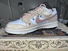 NIKE DUNK LOWWHITE/MTLC RED BRONZE BLANC/RGE BRONZE MTL