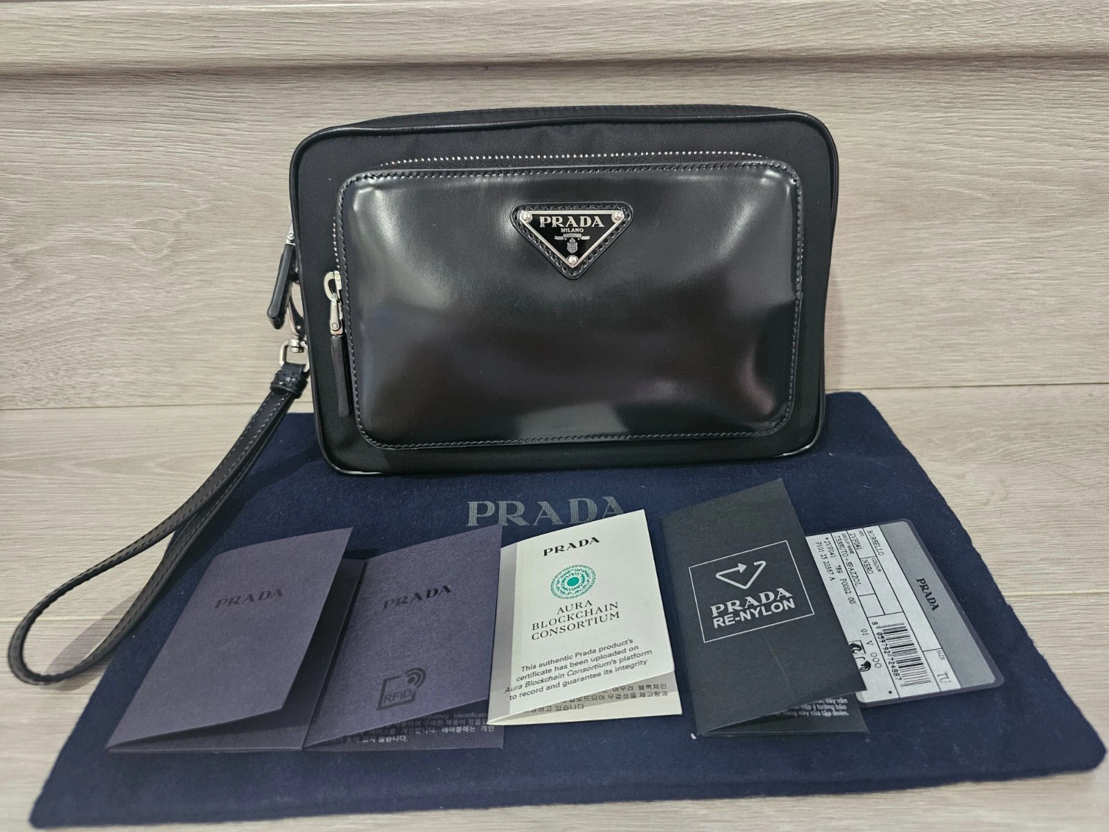 Prada — PRADA 2VF041 Re-Nylon w/ glossy leather small clutch bag RRP$2850