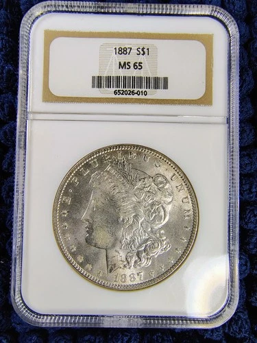 1887  Morgan Silver Dollar - Philadelphia Mint - NGC MS 65 - Light Obv. Toning