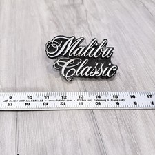 1976-1977 Malibu Classic Grille Emblem 364489 El Camino Chevelle Script Badge