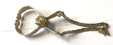 8.196 Vintage glove clip, gold tone