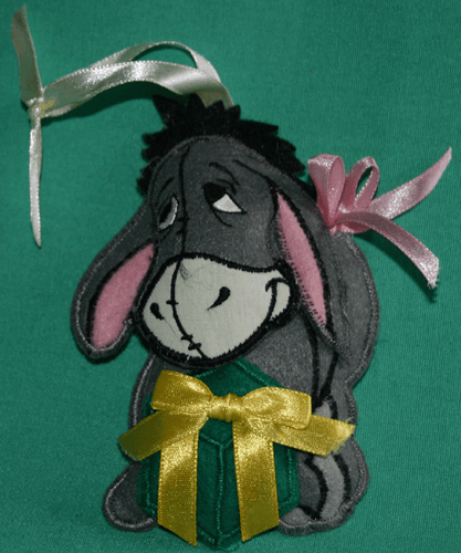 DISNEY PARK VINTAGE EEYORE WITH GIFT PLUSH HOLIDAY CHRISTMAS ORNAMENT NEW