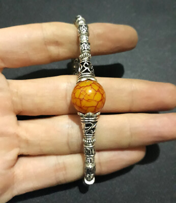 Bracelet imitation perle 10 mm avec médaille sur élastique – SERAL I