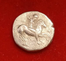 CALABRIA, TARENTUM AR Didrachm Nomos 280 BC. Warrior horseman Taras on dolphin