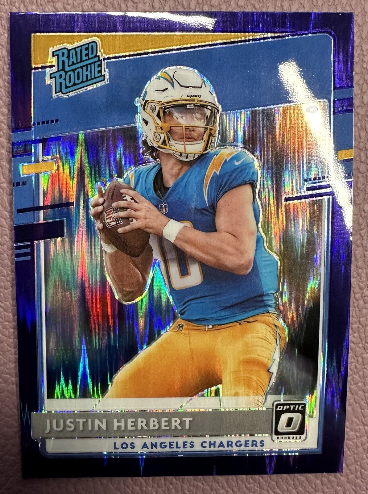 2020 Panini Donruss Optic Rated Rookie #153 Purple Shock Justin Herbert Chargers