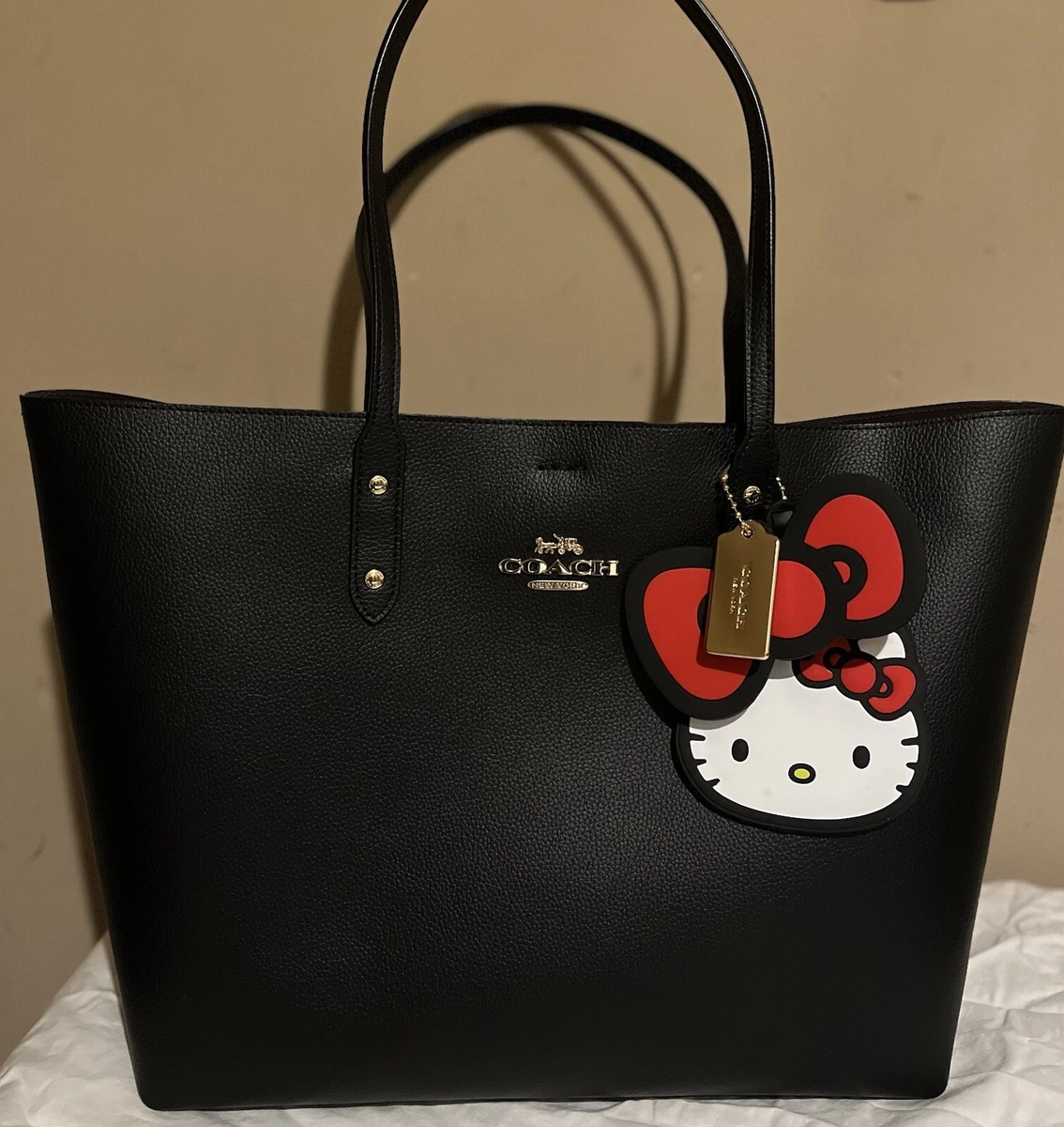 Hello kitty coach bag hotsell