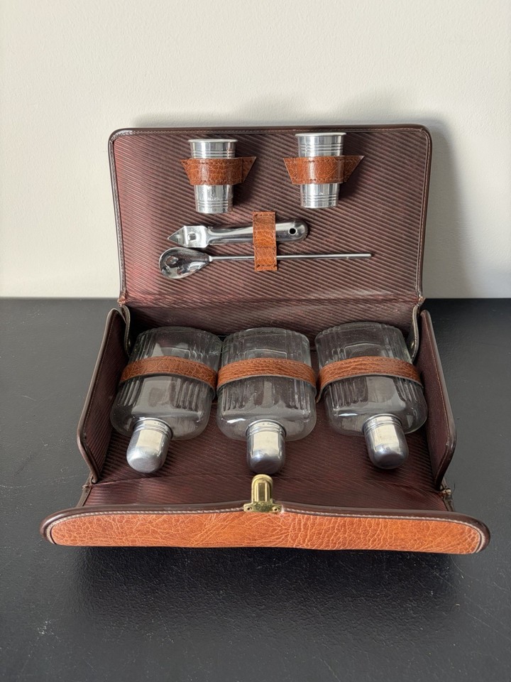 A genuine antique Royalshire portable bar set in a fitted case — the James Bond of home bar accessories before James Bond existed.