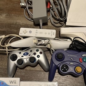 11lb Nintendo Wii & WiiU Console Lot of 2 Black White, 11 Games Cables Remotes
