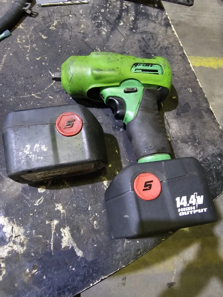 Green Snap On 14.4 3/8 Drive Cordless Impact includes  charger ser description  - Image 2 of 3