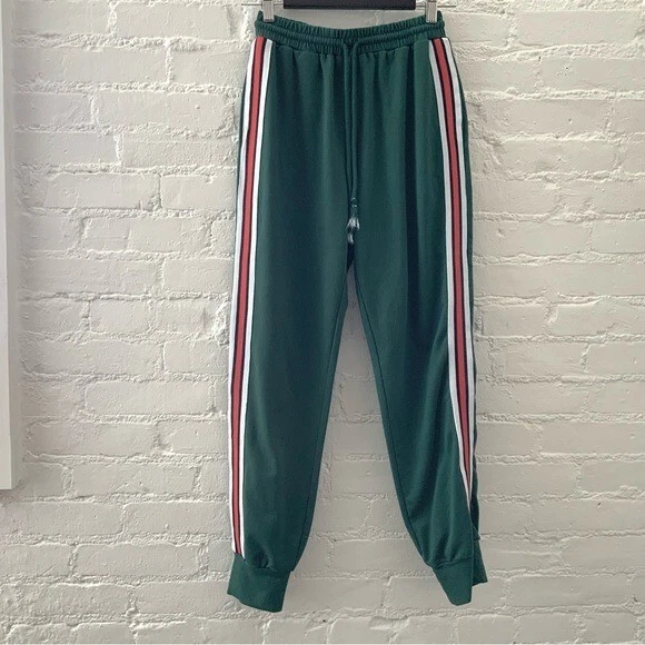 Green and red track pants sale